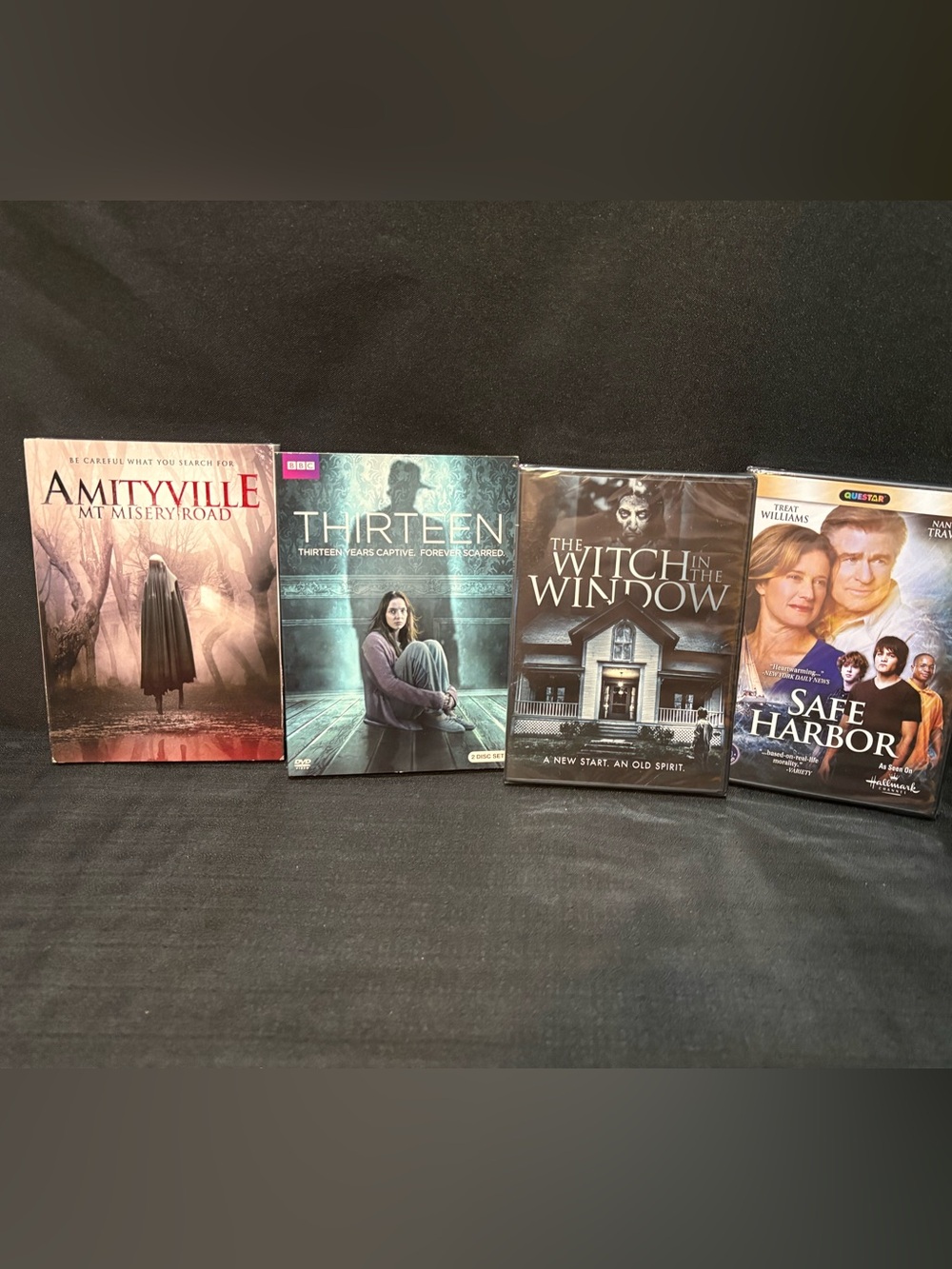 4 new DVDs Safe Harbor , The Witch in the Window, Thirteen & Amityville